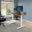 Electric Standing Desk 48x30 white and walnut in raised position at home